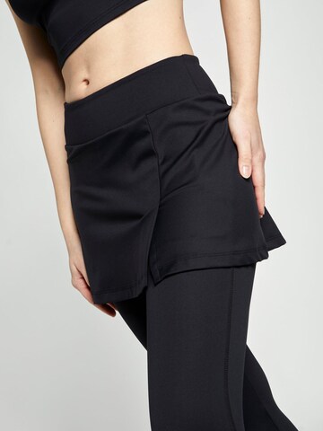 Regular Pantalon de sport '2-in-1 Skirt' SPORTKIND en noir