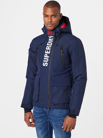 Superdry Snow Outdoorjas 'Ultimate Rescue' in Blauw: voorkant