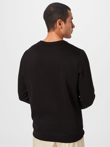 PUMA - Sweatshirt de desporto 'Essentials' em preto