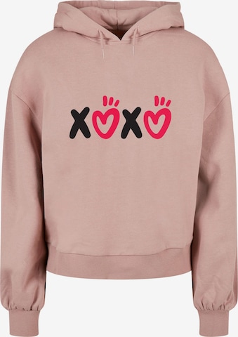 Merchcode Sweatshirt 'Valentines Day - XOXO' in Roze: voorkant