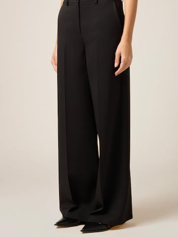 oltre Baggy Trousers in Black