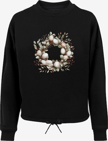 Sweat-shirt 'Osterkranz Eierkranz Blumenring' F4NT4STIC en noir : devant
