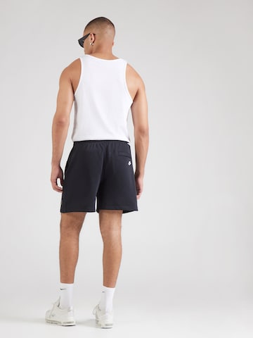 Loosefit Pantalon 'Club' Nike Sportswear en noir