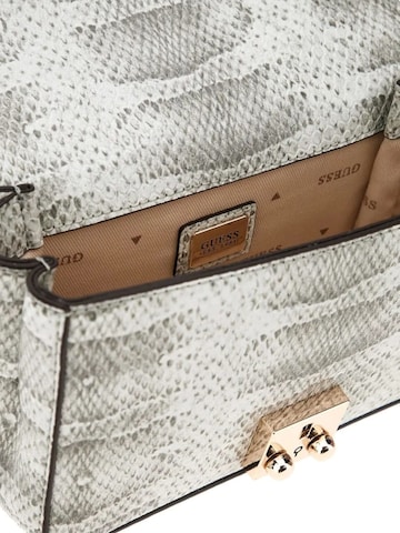 GUESS Handtas 'Guess Sac Rabat Deesa Convertible Xb Natural' in Beige