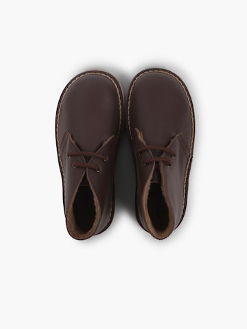 Pisamonas - Botas en marrón