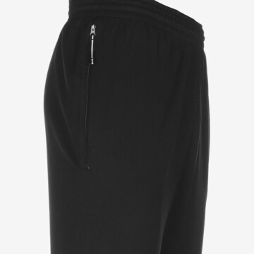 Regular Pantalon de sport NIKE en noir