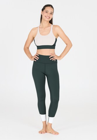 Athlecia Skinny Sports trousers 'Aspasia' in Green