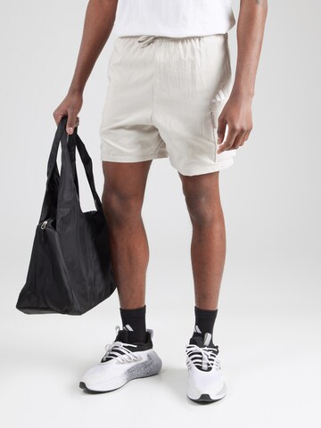 regular Pantaloni sportivi 'Essentials' di ADIDAS SPORTSWEAR in beige: frontale