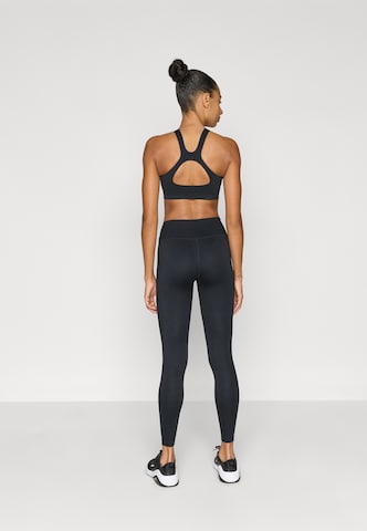 NIKE - Skinny Calças de desporto 'ONE' em preto