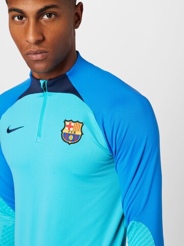 T-Shirt fonctionnel NIKE en bleu