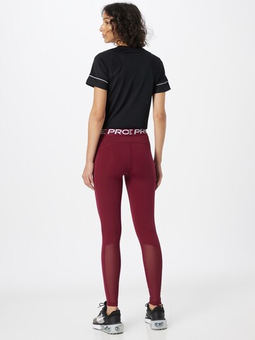 NIKE Skinny Sporthose in Rot