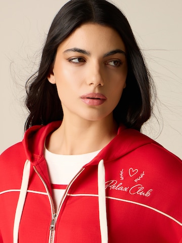 Pullover di oltre in rosso