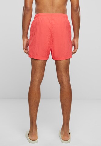 regular Pantaloni di Karl Kani in rosso