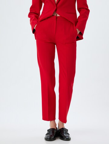 Koton Regular Chino trousers in Red: front