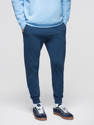 Effilé Pantalon de sport Ombre en bleu