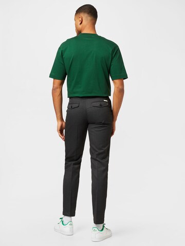 Tapered Pantaloni con pieghe 'POND' di forét in nero