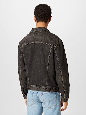 LEVI'S ® Between-season jacket 'The Trucker Jacket' in Black