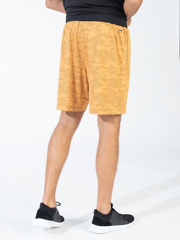Regular Pantalon de sport Spyder en orange