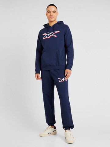 Effilé Pantalon de sport Reebok en bleu