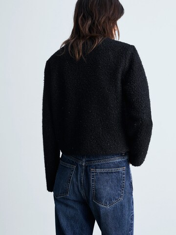 Veste mi-saison 'MELCA' MANGO en noir