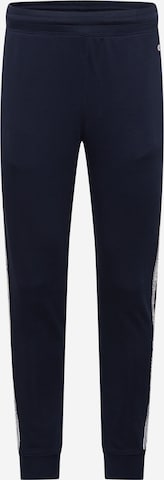 Champion Authentic Athletic Apparel - Calças em azul: frente