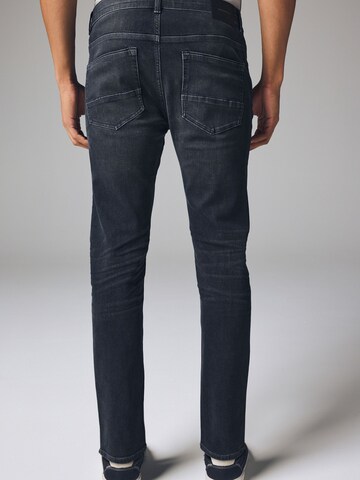 Next Slimfit Jeans i grå