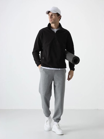 Giacca di pile di Tommy Life in nero