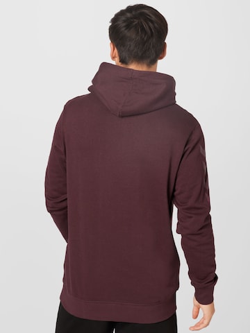 Hummel Sweatshirt 'LEGACY' in Bruin
