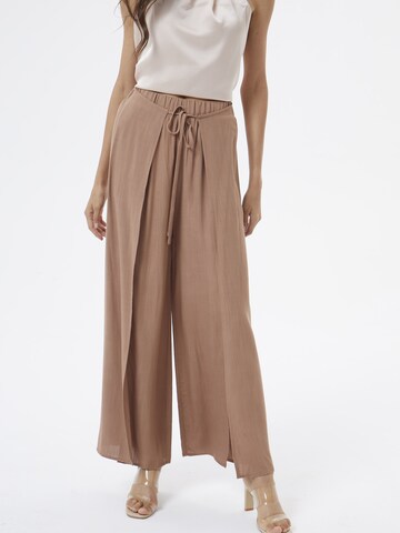 AIKI KEYLOOK Loose fit Pants 'Static' in Brown: front