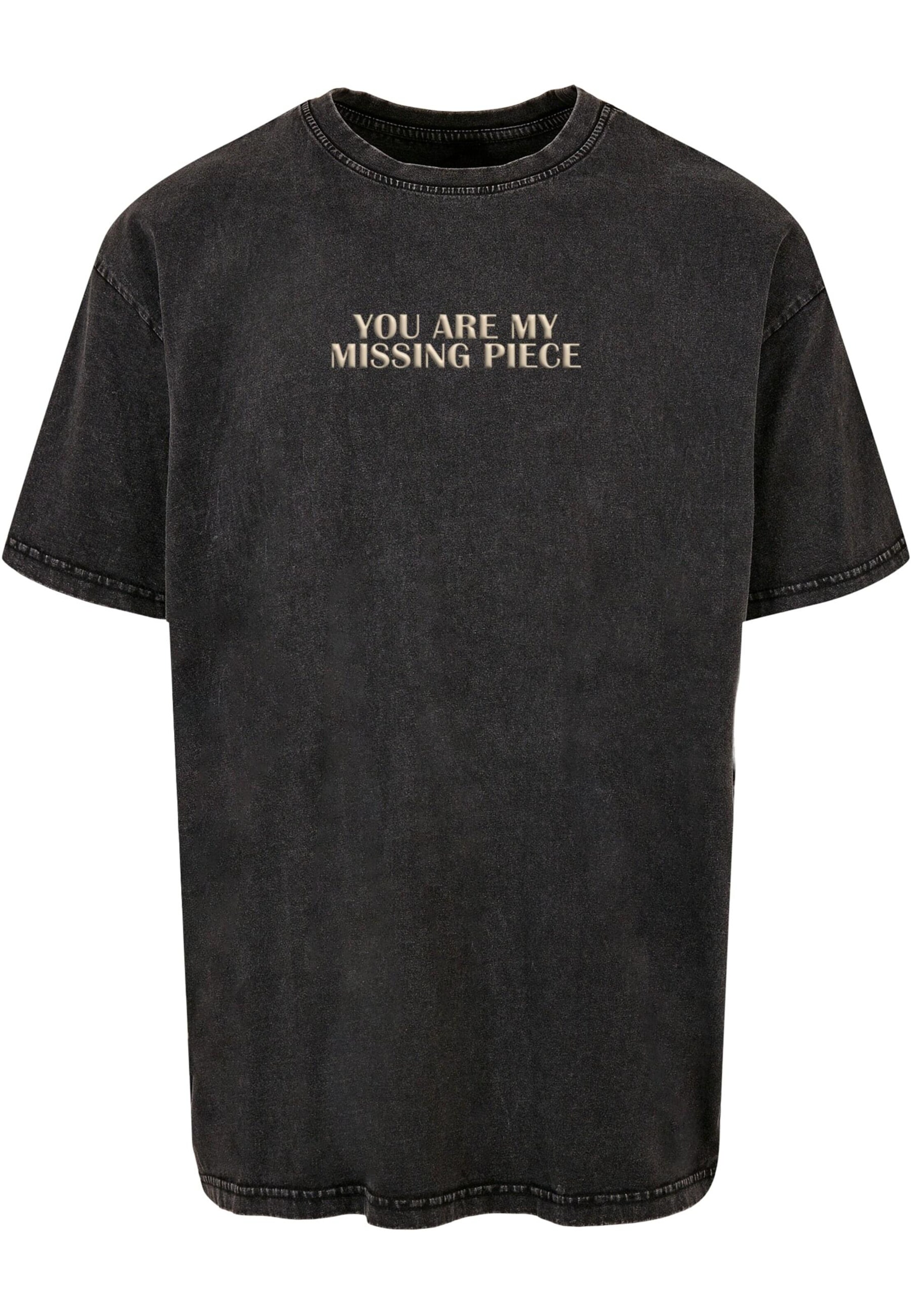 Merchcode T-Shirt 'Missing Piece' in Schwarz: Vorderseite
