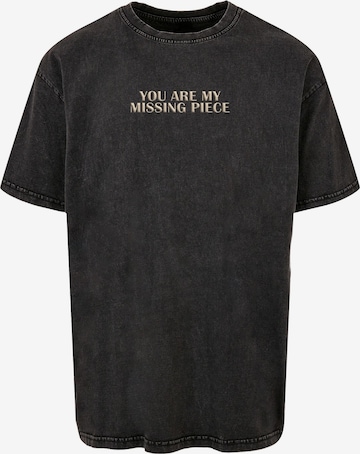 Merchcode T-Shirt 'Missing Piece' in Schwarz: predná strana