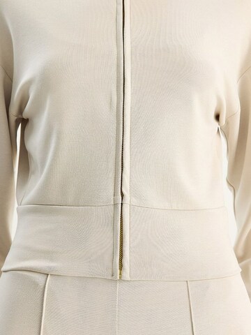 Bianco Lucci - Calças de fato em bege