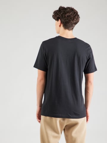 Nike Sportswear - Camiseta 'AIR' en negro