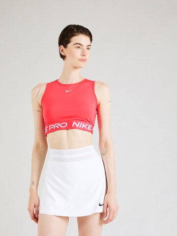 NIKE Top sportowy 'PRO 365' w kolorze różowy: przód