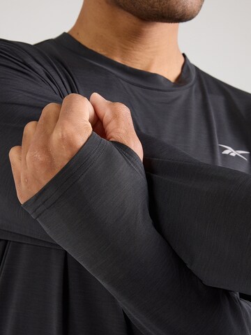Reebok Koszulka funkcyjna w kolorze czarny