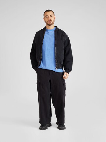 Carhartt WIP Overgangsjakke 'Paxon' i sort