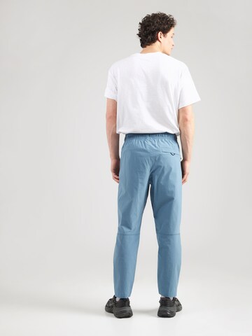 zils Nike Sportswear Pakapēniski sašaurināts piegriezums Bikses