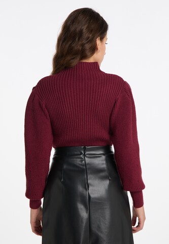 Pullover di faina in rosso