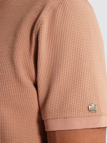 CAST IRON Paita 'Polo shirt with two-tone waffle texture' värissä oranssi