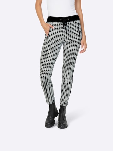 Coupe slim Pantalon heine en noir : devant