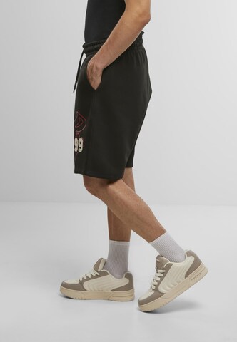 regular Pantaloni sportivi ' ' di ROCAWEAR in nero