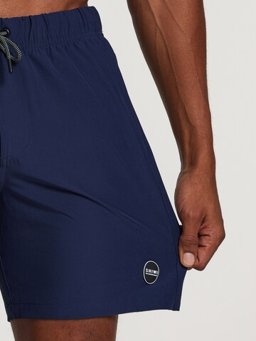 Shiwi Board Shorts 'easy mike solid 4-way stretch' in Blau