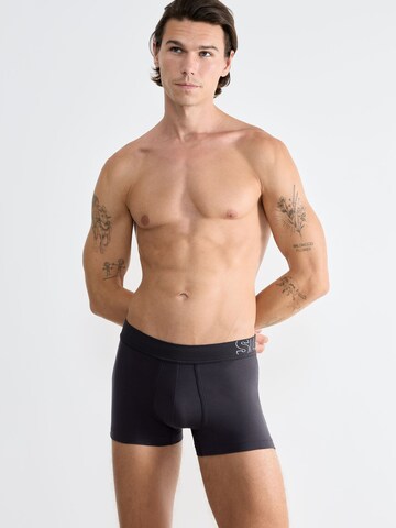 SLOGGI Boxer shorts ' Trunks ' in Black: front