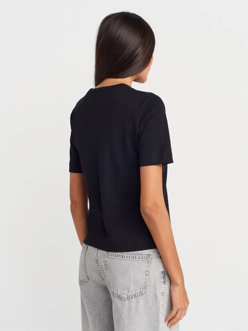 Maglietta di Dilvin in nero