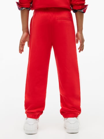 Effilé Pantalon TOMMY HILFIGER en rouge