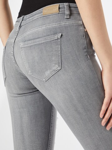 Skinny Jean 'CORAL' ONLY en gris