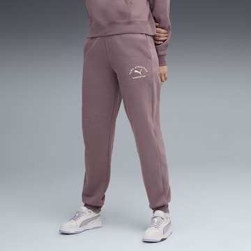 PUMA Tapered Sportbroek in Lila: voorkant