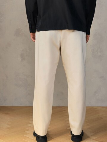 Next Loose fit Pleat-front trousers 'Edit' in Beige