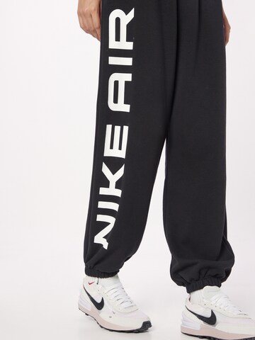 juoda Nike Sportswear Siaurėjantis Kelnės