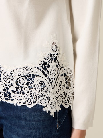 Pullover di oltre in bianco